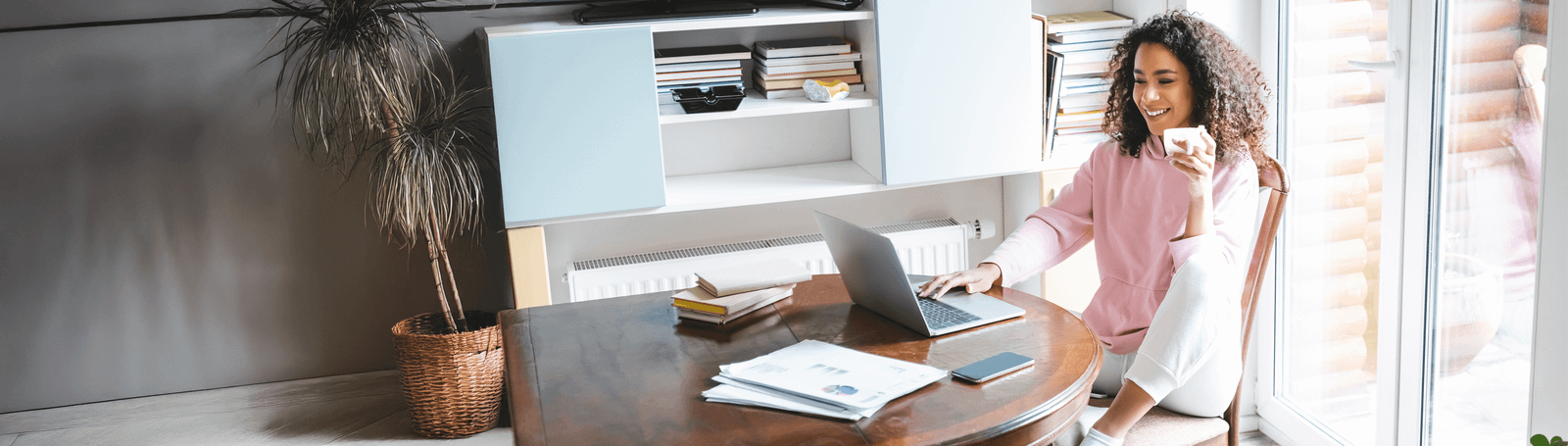 A customer managing her finances at home